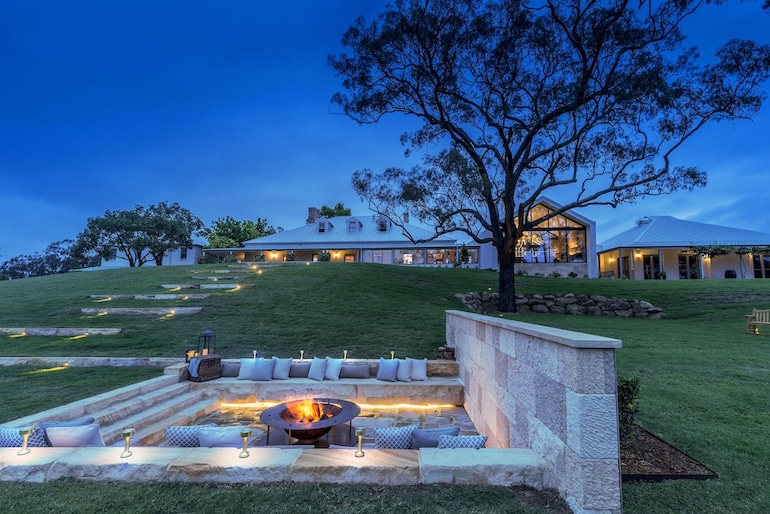 Spicers Guesthouse has spacious lawns with stylish fire pits adding warmth to weekend getaways from Sydney.