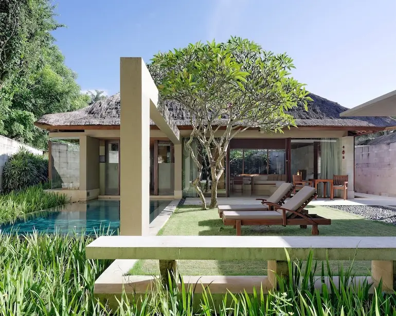 Private pool and sun loungers at The Bale Nusa Dua